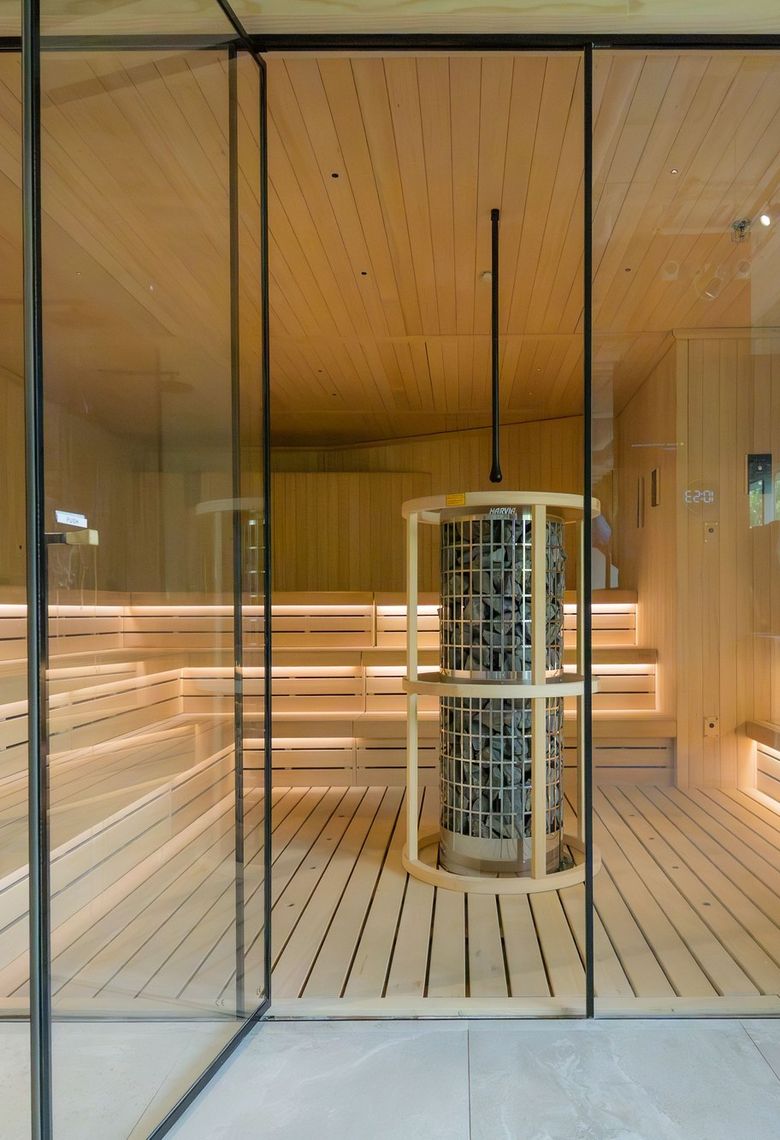 The Finnish sauna, warmly lit and ready