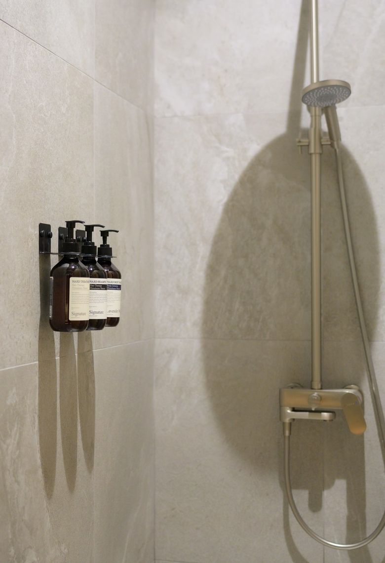 Everything provided — towels and amenities in every shower